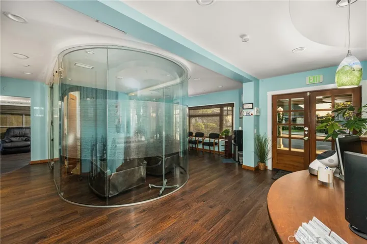 View of glass enclosed conference room in lobby