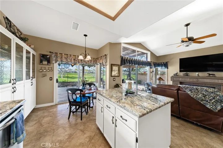 Lots of glass front cabinets in your kitchen.
