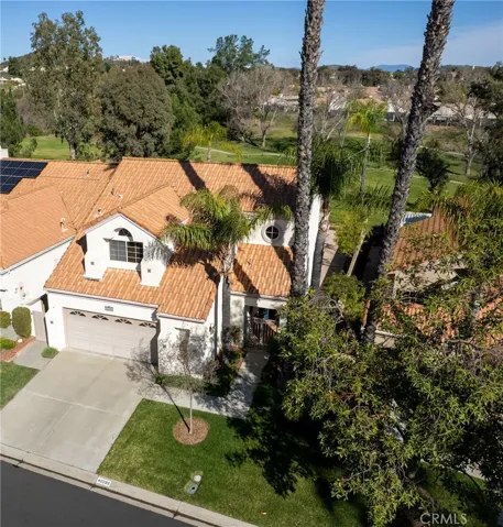 Ideal location with the golf course right outside your back patio.