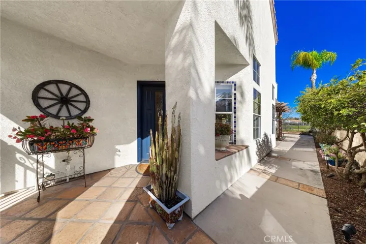 Your welcoming entry and side walk to the back yard.