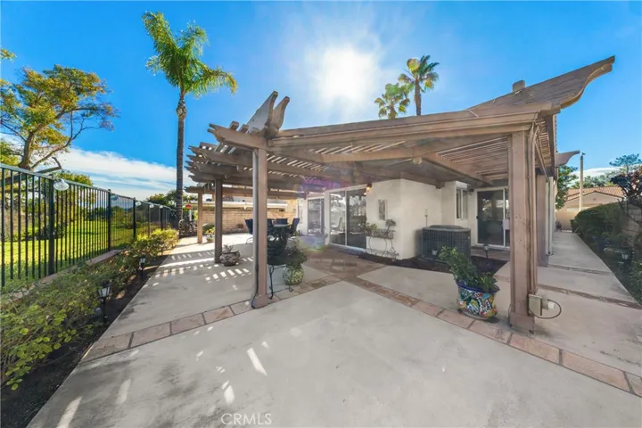 Back patio gives you level panoramic golf course views with clean walkways on both sides of the home.