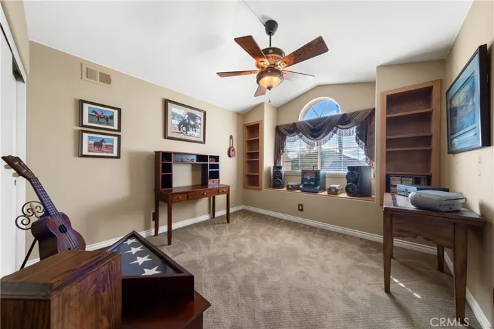 The guest bedroom with a charming window seat is upstairs and has a private bathroom.  There is a walk-in closet and a wall closet in this guest room.