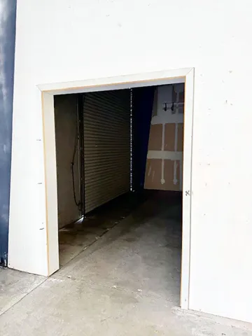 Doorway through Warehouse