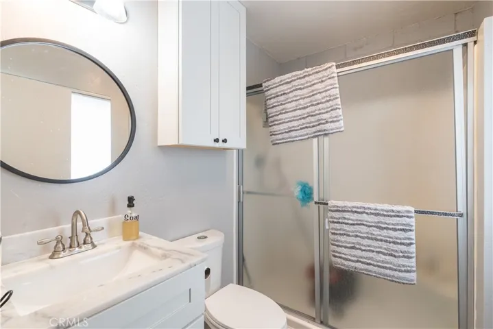 Back bath serves the second bedroom and is easily accessed from the back door