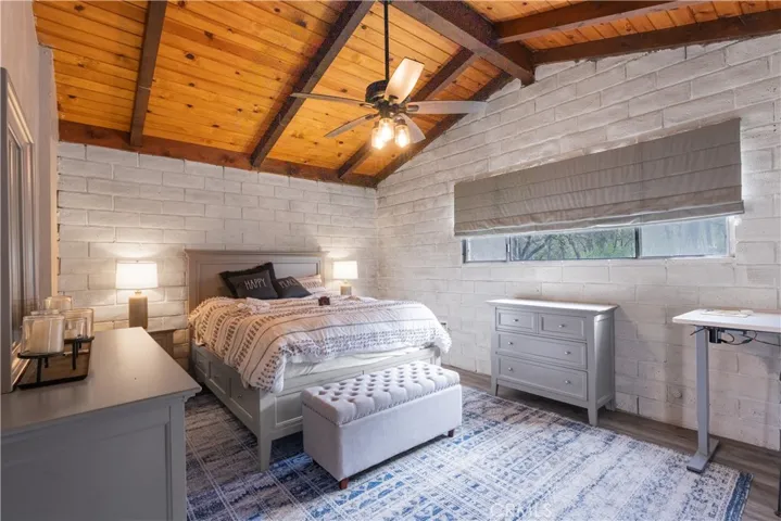 Large bedroom with sliding doors to the deck