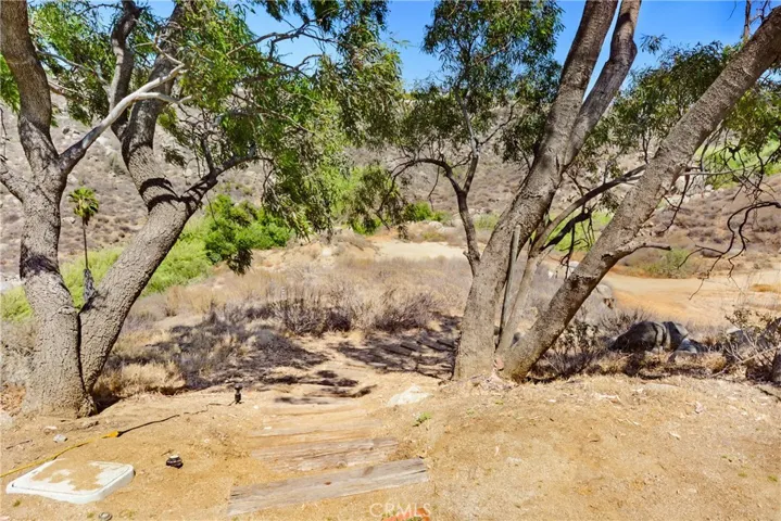 Stairway leading down to side of the property