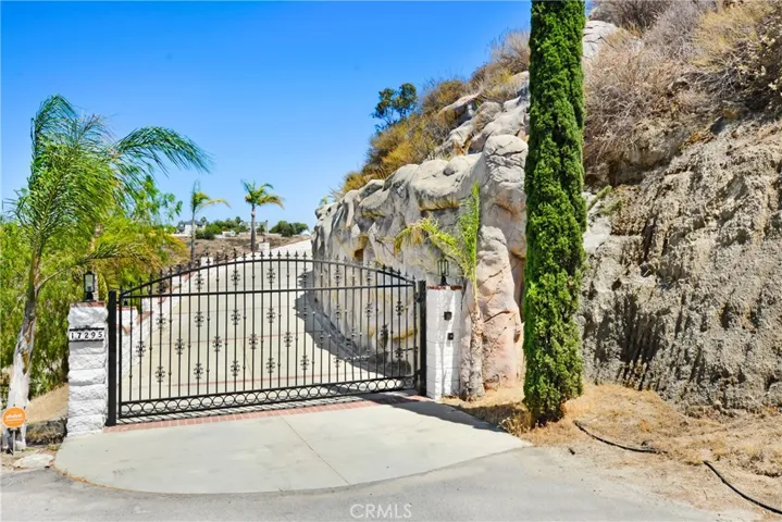 Closed gate leading to drive way