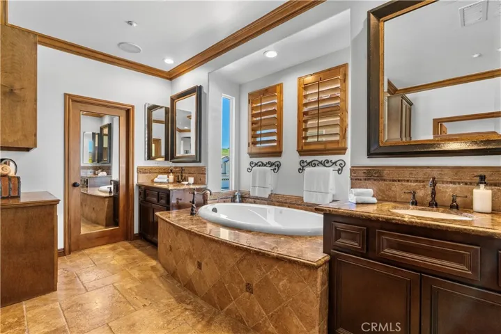 Master Bathroom with marble countertops