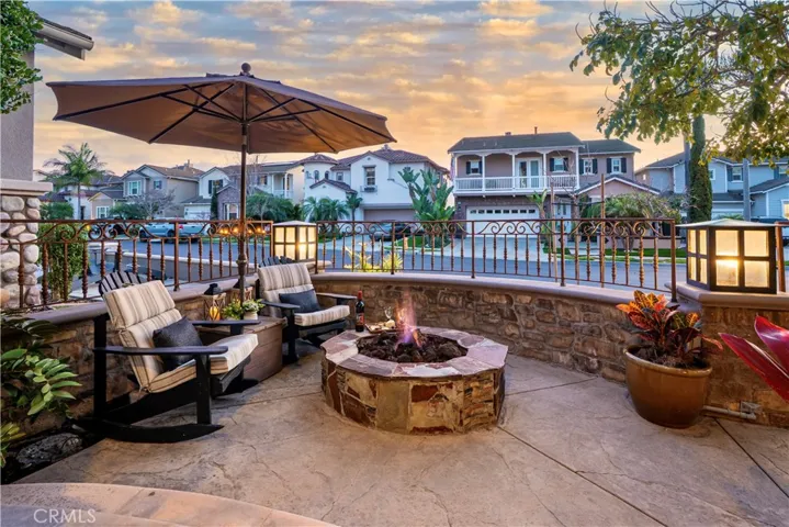 View of the Front Entertaining Area with Fire Pit and sunset seabreezes.