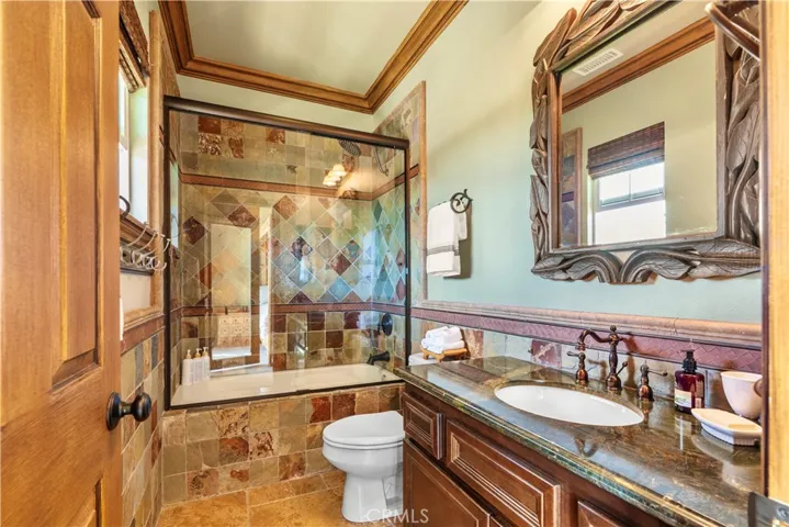 Bathroom #2, attached and private in Bedroom #2.