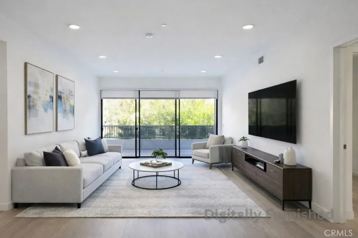 Living Room, Virtually Staged. Photo is not this exact unit but is representative of quality and finish.