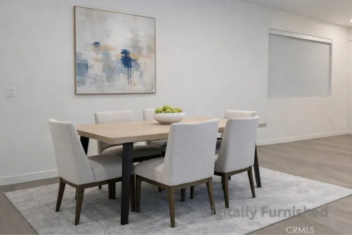 Dining area, Virtually Staged. Photo is not this exact unit but is representative of quality and finish.