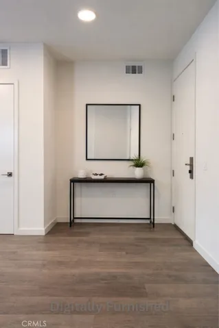 Entry, Virtually Staged. Photo is not this exact unit but is representative of quality and finish.