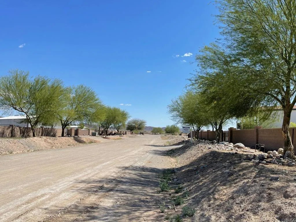 Looking from South towards lot in the North - Nice homes in the area