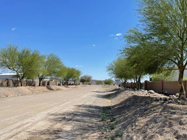 Looking from South towards lot in the North - Nice homes in the area