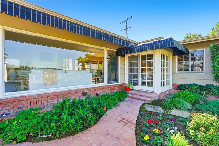 Large windows and detailed brick work add so much character to this stunning property!
