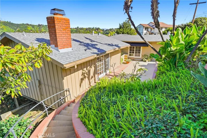 One of the pathways from the main house to the lower patio and living spaces!