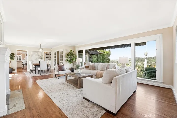 This open concept living/dining room area has views out of every window and is full of natural light!