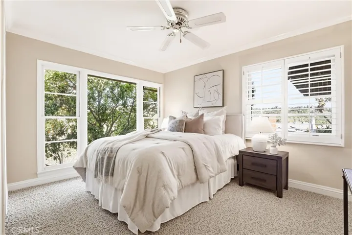 Bedroom #2 has great natural light and views of the property!
