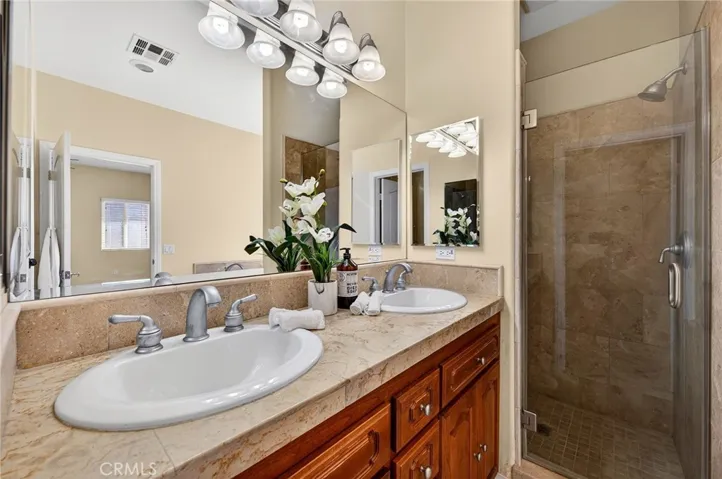 separate glass-enclosed shower