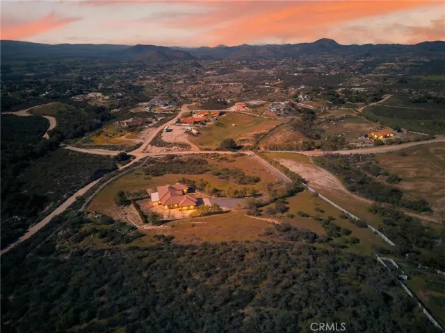 39475 Bruce Ln. evening aerial view. picture virtually enhanced