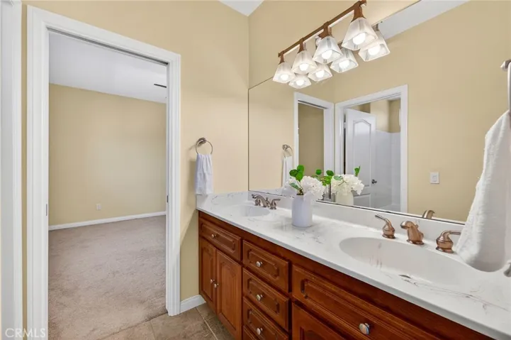 39475 Bruce Ln dual-sink vanity with a solid surface countertop