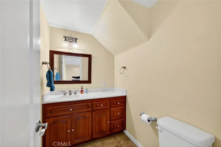 half bathroom located by the bonus room