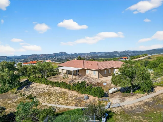 39475 Bruce Ln. aerial view of the back side of the home.