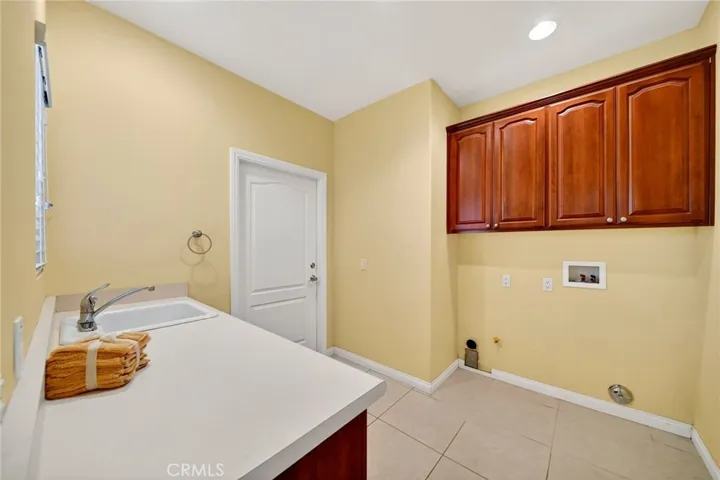 washer and dryer hookups  and cabinets