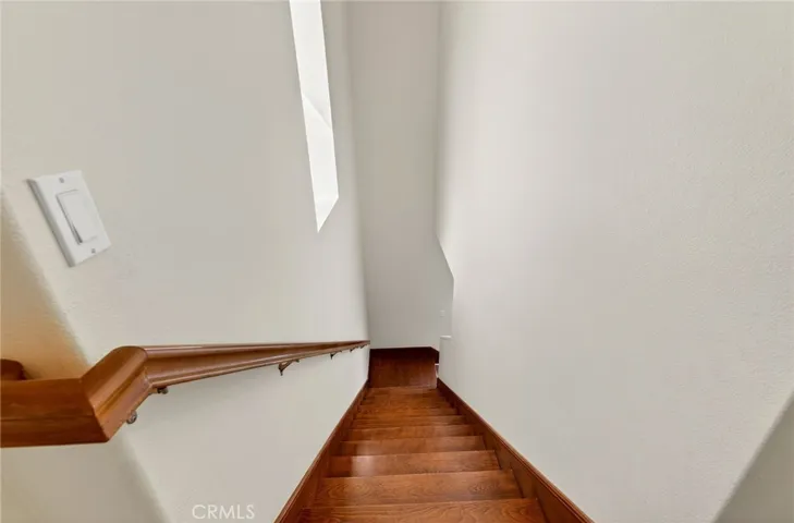 he wood staircase between levels