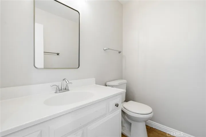 Clean and functional half bath located on the main level.