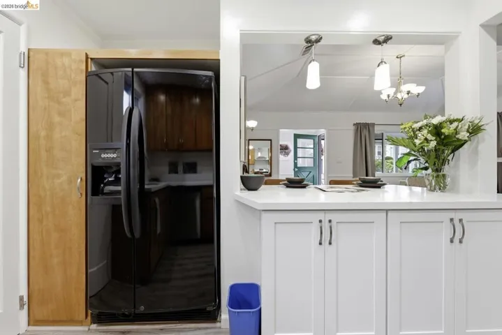 Kitchen is open to dining area/living room.