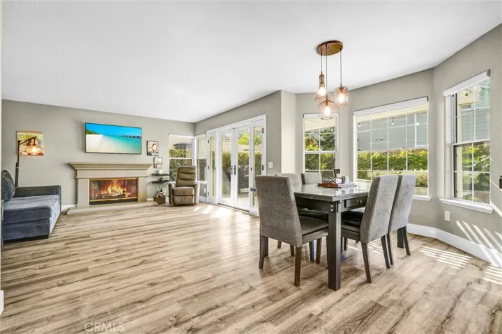 Fire in fireplace and flatscreen scenery have been digitally added.