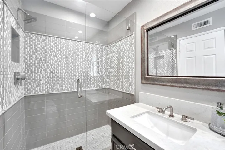 Downstairs bathroom with large custom shower