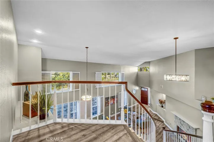 Second floor overlooking the downstairs formal living area