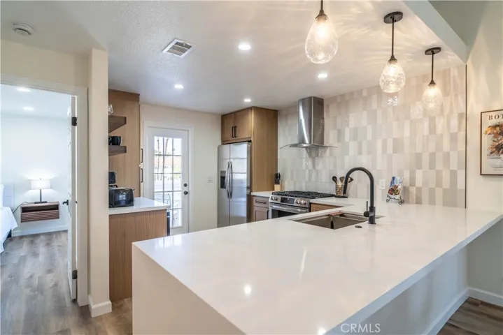 Quartz counter with all new stainless steel appliances