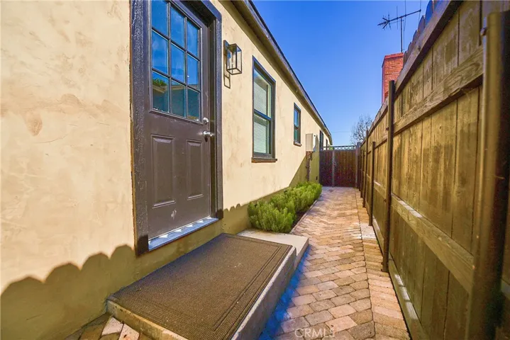 Pavers on the side-yard for easy care and an upscale look
