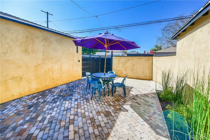 Pavers make for easy care and high-end looks! This backyard is just waiting to have company over! It's also a perfectly serene place to relax, read a book or have morning coffee.