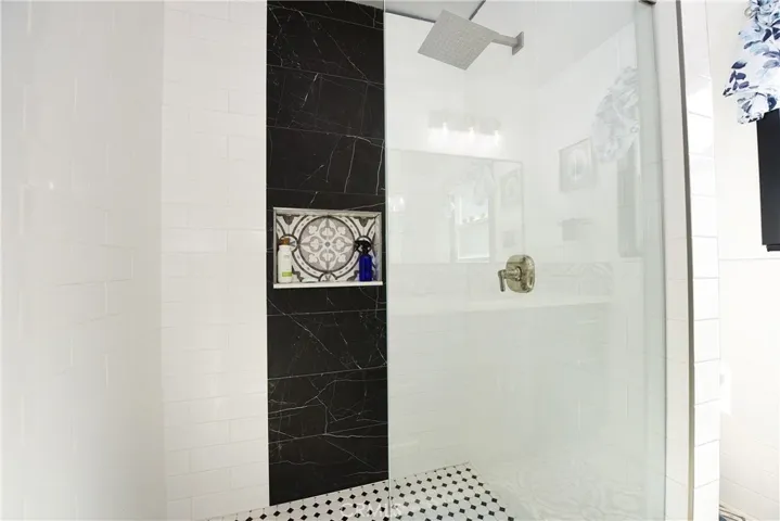 Guest Bathroom - Timeless style with high customization come together to create this gorgeous oversized glass enclosed shower