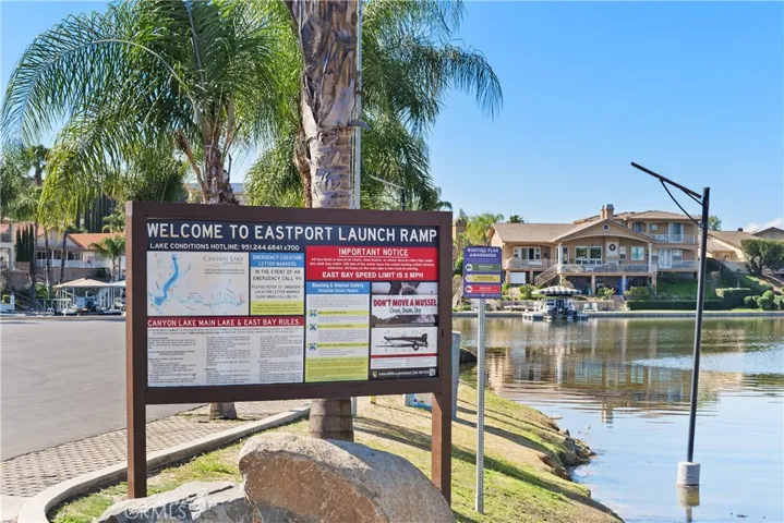 Community signage and neighborhood amenities located near the waterfront area