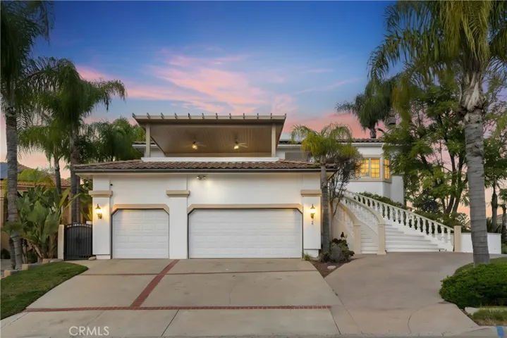 Beautiful curb appeal; spacious driveways. Direct access garage