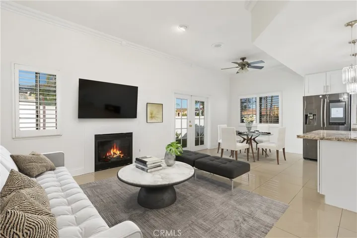 Open family room with adjacent breakfast nook, directly connected to the kitchen for easy everyday living