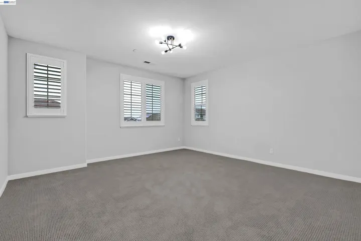 Huge master bedroom with lots of lights