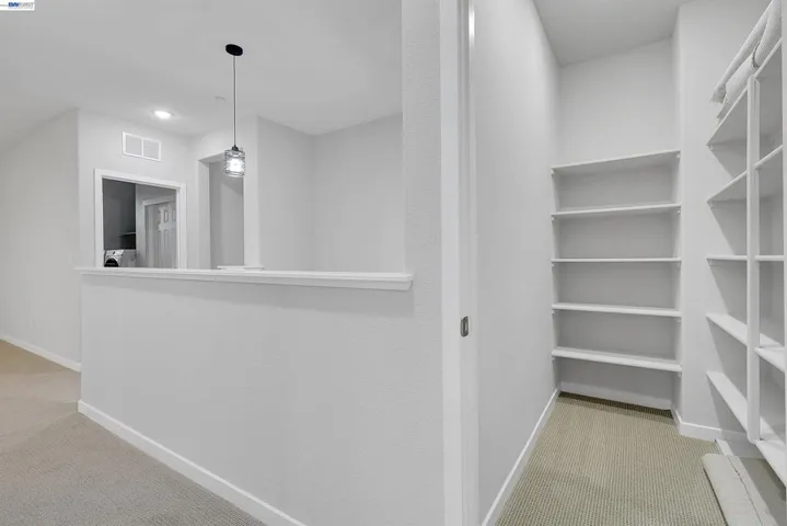 Hall way bathroom for shelf