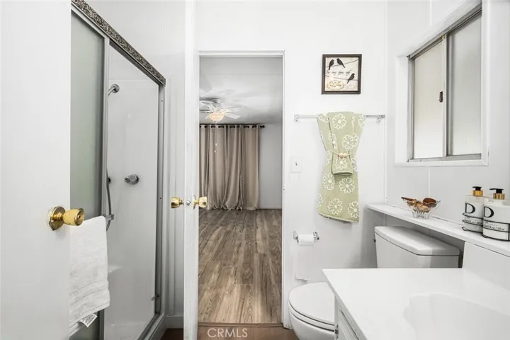 Guest bathroom features walk-in shower