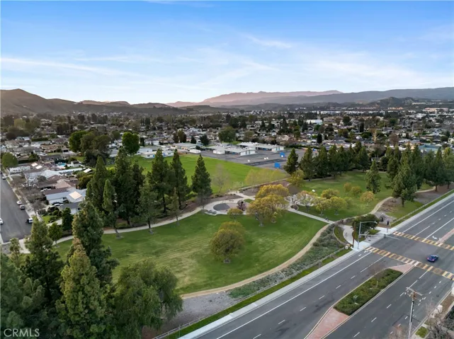 Nearby Lincoln Park with walking trails, a basketball court, grassy play areas, etc.