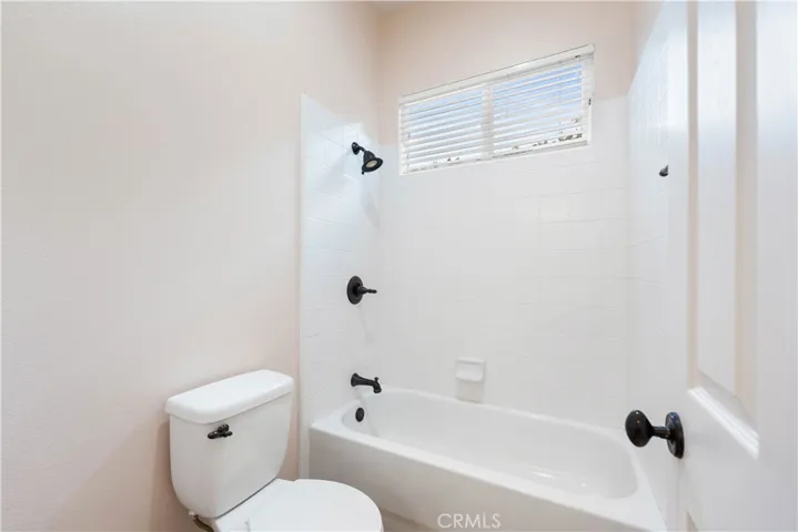 Full bath tub & shower in between bedrooms 2 & 3.