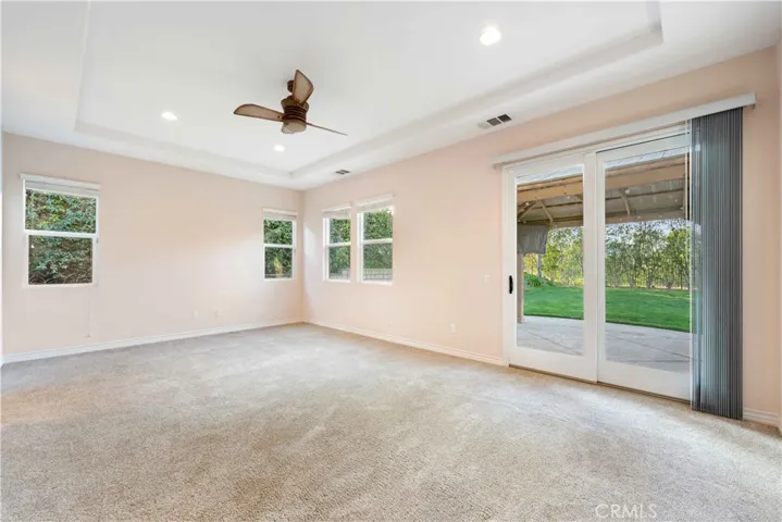 Large primary suite with slider to the backyard