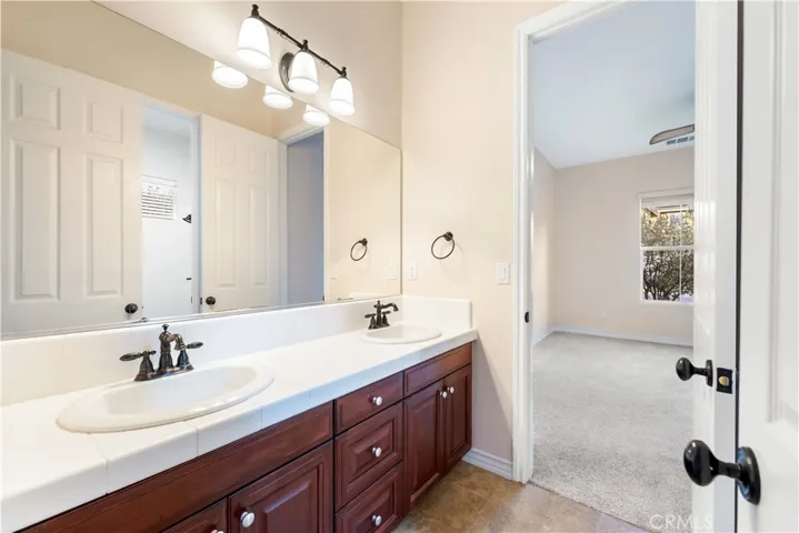 Full bath attached to bedrooms 2 & 3, with double sinks