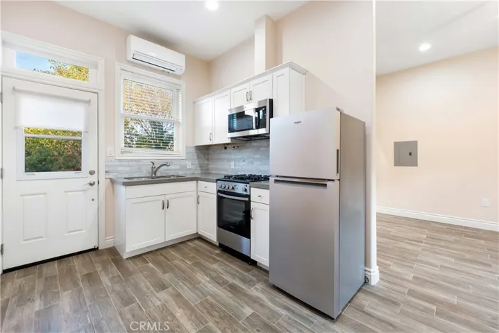 Fully equipped ADU kitchen w/side yard entrance